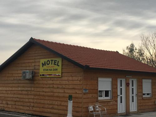 a motel sign on the side of a building at Anna's Place in Čapljina