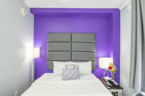 Cama o camas de una habitación en Canal Loft Hotel