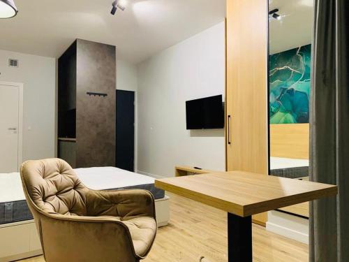 TV a/nebo společenská místnost v ubytování W Apartments