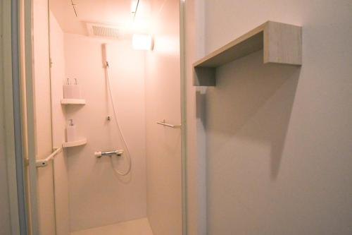 a bathroom with a shower and a toilet in it at Manabiamu 4F - Vacation STAY 58913v in Maizuru