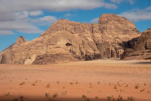 a view of a mountain in the desert at Wadi Rum Nights in Wadi Rum