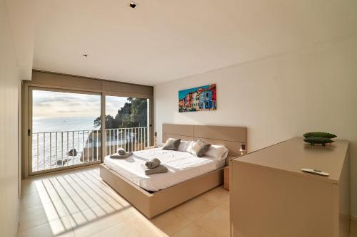 Ένα ή περισσότερα κρεβάτια σε δωμάτιο στο CASA BRISA