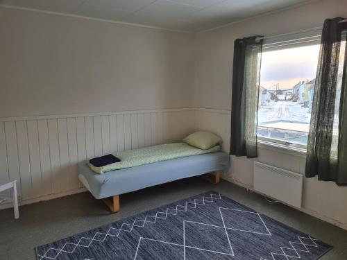 Postel nebo postele na pokoji v ubytování Festningsgaten 3 b