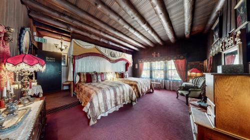 a bedroom with a large bed in a room at Inn of Glen Haven in Glen Haven