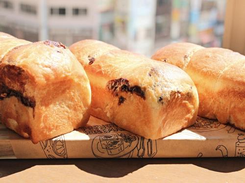 a group of bread sitting on top of a table at Nagano Tokyu REI Hotel in Nagano
