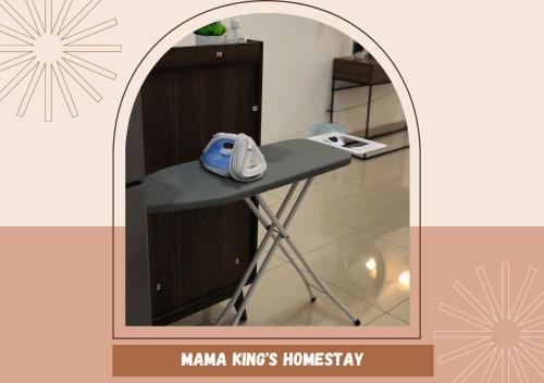 a room with a table with a phone on it at Mama King’s Homestay@ Palas Horizon in Brinchang
