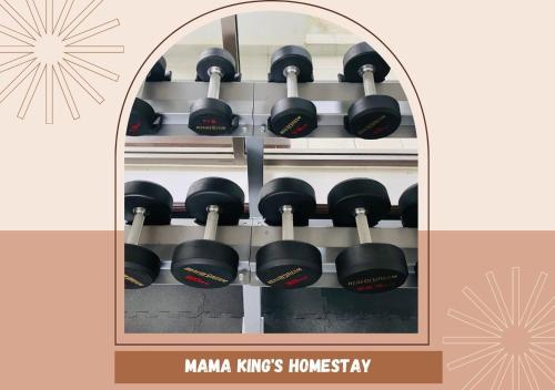 a bunch of dumbbells on a shelf in a room at Mama King’s Homestay@ Palas Horizon in Brinchang
