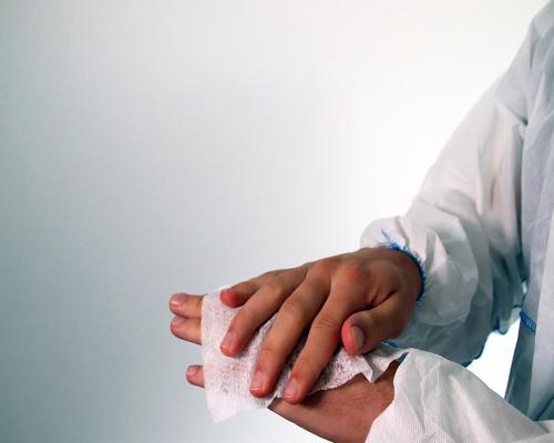 a person holding a napkin in their hand at Vythiri Village in Vythiri