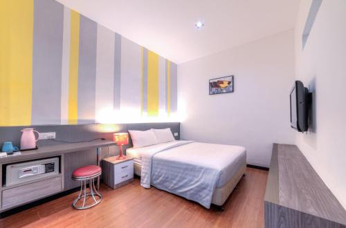 Μια τηλεόραση ή/και κέντρο ψυχαγωγίας στο Yan Hotel