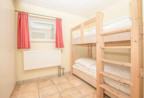 Ένα ή περισσότερα κρεβάτια σε δωμάτιο στο KUM Hus