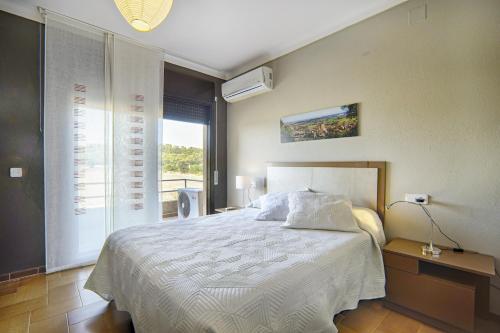 Ένα ή περισσότερα κρεβάτια σε δωμάτιο στο Mediterranean Paradise with private pool