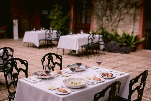 
a table with plates of food on it at Mont-Sant in Xàtiva
