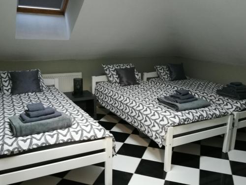Postel nebo postele na pokoji v ubytování Apartmani Sunset
