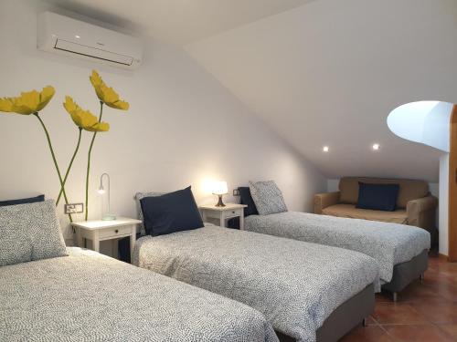 Un pat sau paturi într-o cameră la Adeje Paradise Apartments