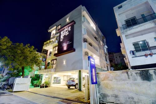 a building with a sign on the side of it at Elite Homes in Aurangabad