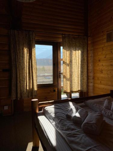 Giường trong phòng chung tại CasaNoah