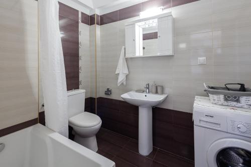 Ένα μπάνιο στο Vourvahis Seaview Apartments
