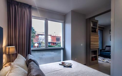 Postel nebo postele na pokoji v ubytování VivaBien Playa I - Apartamentos junto al mar