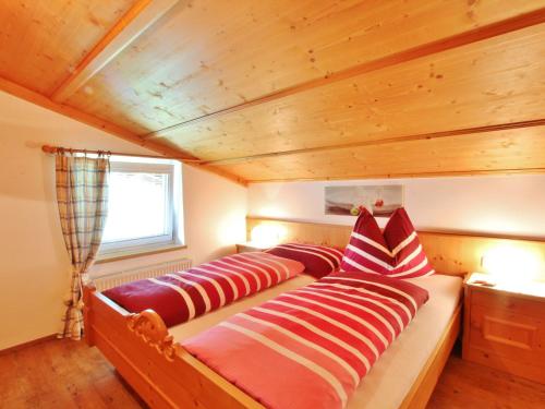 Postel nebo postele na pokoji v ubytování Apartment in Bramberg near Wildkogel Arena