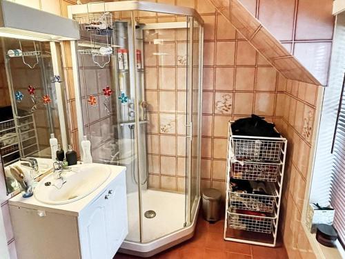 a bathroom with a shower and a sink at 8 person holiday home in MÅLØY-By Traum in Måløy