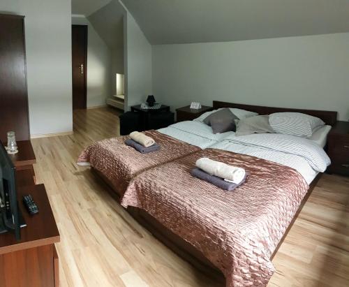 Кровать или кровати в номере Zajazd Park