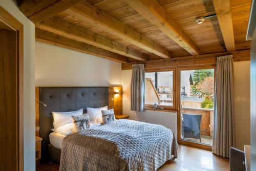 Кровать или кровати в номере Princess Bergfrieden
