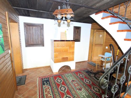a view of a room with a staircase and a stair case at Apartment in Fresach near Ski Slopes in Fresach