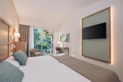 Katil atau katil-katil dalam bilik di Iberostar Waves Cala Domingos All Inclusive