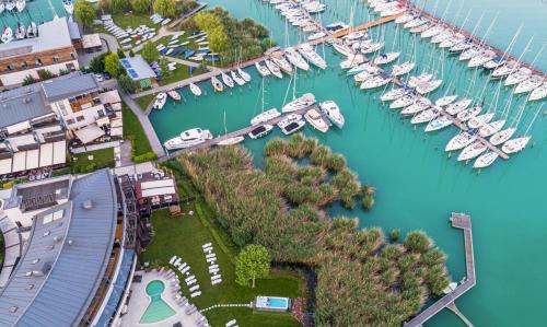 an aerial view of a marina with boats at Hotel Golden Lake Resort in Balatonfüred