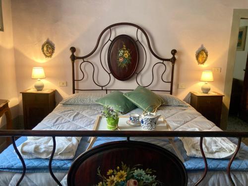 Postel nebo postele na pokoji v ubytování Casa Vacanze Beppina Cortona