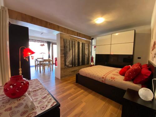 Postel nebo postele na pokoji v ubytování Nidi del faggio rosso - Family Holiday Home