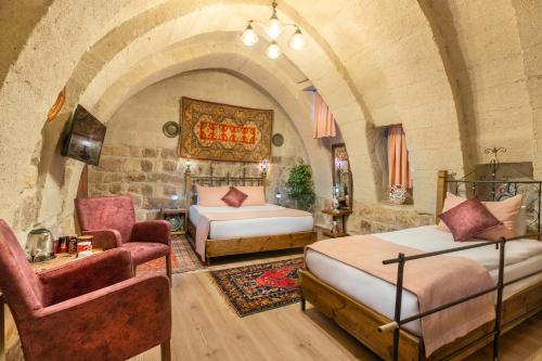 Postel nebo postele na pokoji v ubytování Maron Stone House