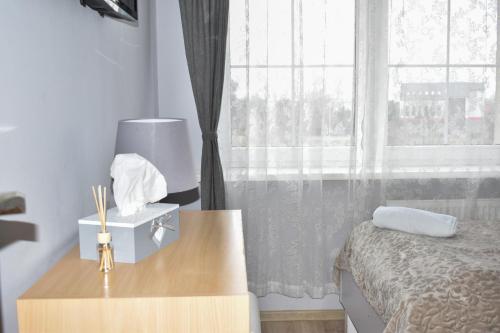 Televisyen dan/atau pusat hiburan di Hostel Przed Świtem