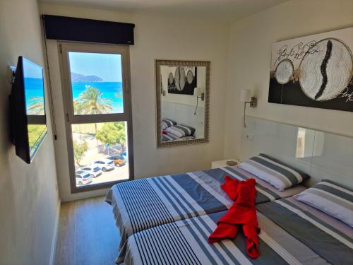 Postel nebo postele na pokoji v ubytování Modern apartment with stunning sea view