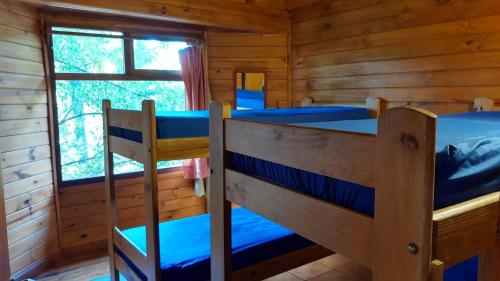Двухъярусная кровать или двухъярусные кровати в номере Calen-Hue