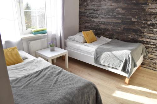 Katil atau katil-katil dalam bilik di Hostel Przed Świtem