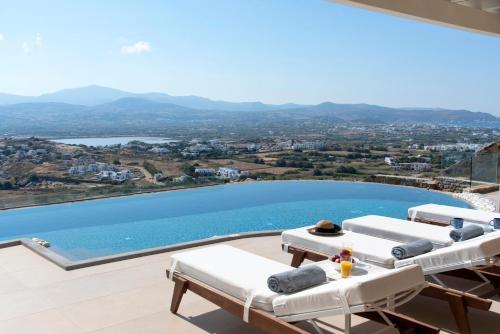 a view of a swimming pool from a villa at Naxos Rock Villas in Stelida