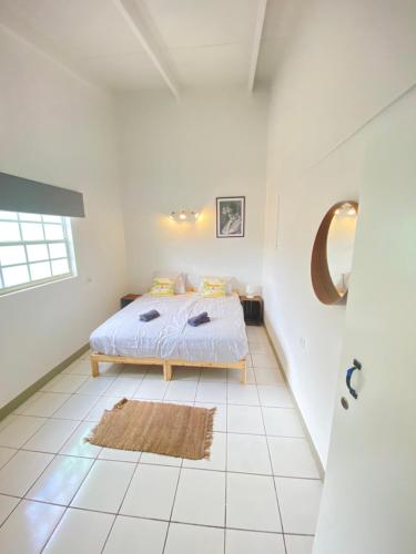 מיטה או מיטות בחדר ב-Poko poko resort