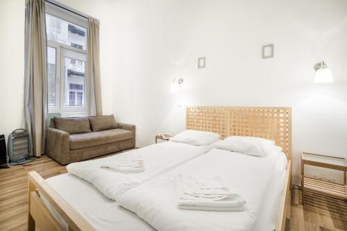 Posteľ alebo postele v izbe v ubytovaní Colorwave Design Apartment