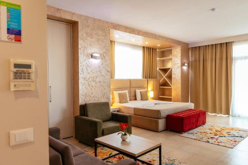 Postel nebo postele na pokoji v ubytování Horizont Hotel