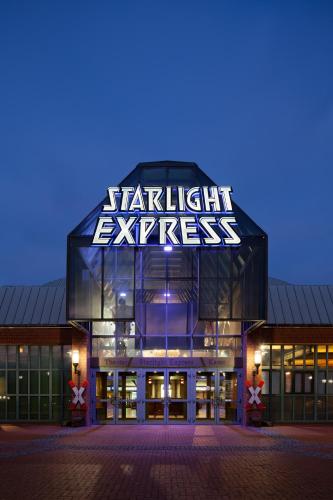 a building with a sign that reads knight express at H+ Hotel Bochum in Bochum