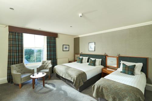 Una cama o camas en una habitación de Crieff Hydro