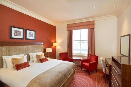 A bed or beds in a room at Crieff Hydro