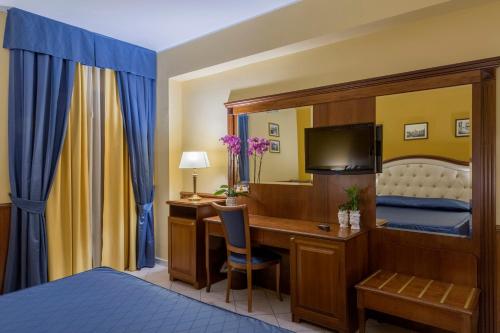 Posteľ alebo postele v izbe v ubytovaní Hotel San Michele