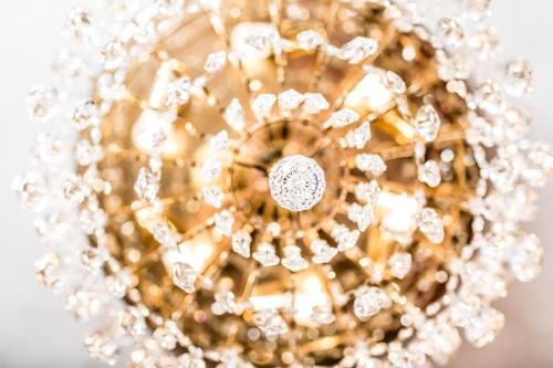 a close up of a diamond chandelier at Romantik & Family Hotel Gardenia***S in Selva di Val Gardena