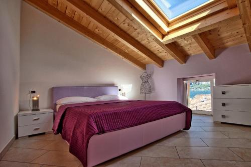 Säng eller sängar i ett rum på Villa Maggie on Lake Como