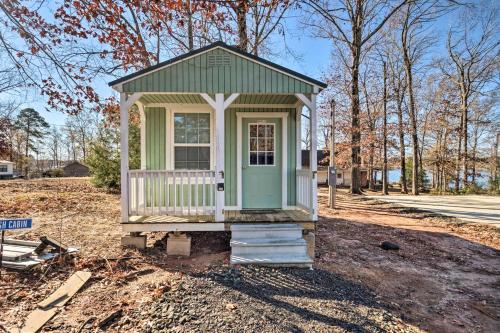 a tiny house is sitting in a yard at Sunny Catfish Cabin with Views of Toledo Bend in Alliance