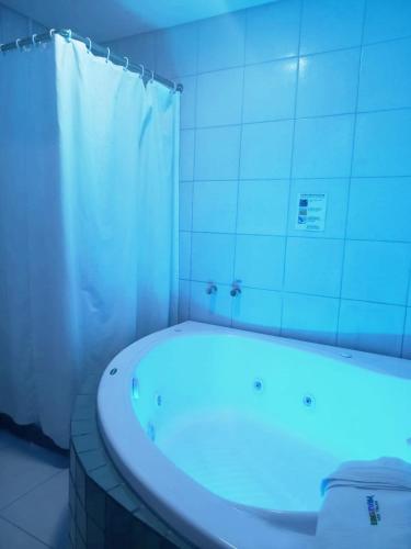 Un baño de Hotel dos PRAZERES (Motel)