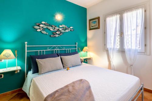 Postel nebo postele na pokoji v ubytování Residence Dei Fiori
