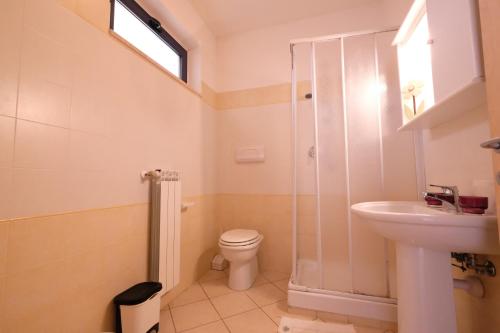 Et badeværelse på Green Bay A7 - Pineto Vacanza